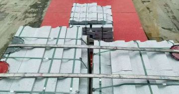 葫芦岛 芝麻白仿形加直形路沿石出货日常