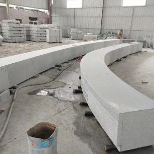 葫芦岛芝麻白花岗岩石板材 园林光面弧形坐凳