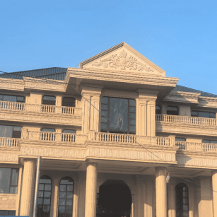 葫芦岛黄金麻别墅外墙干挂石材效果示例