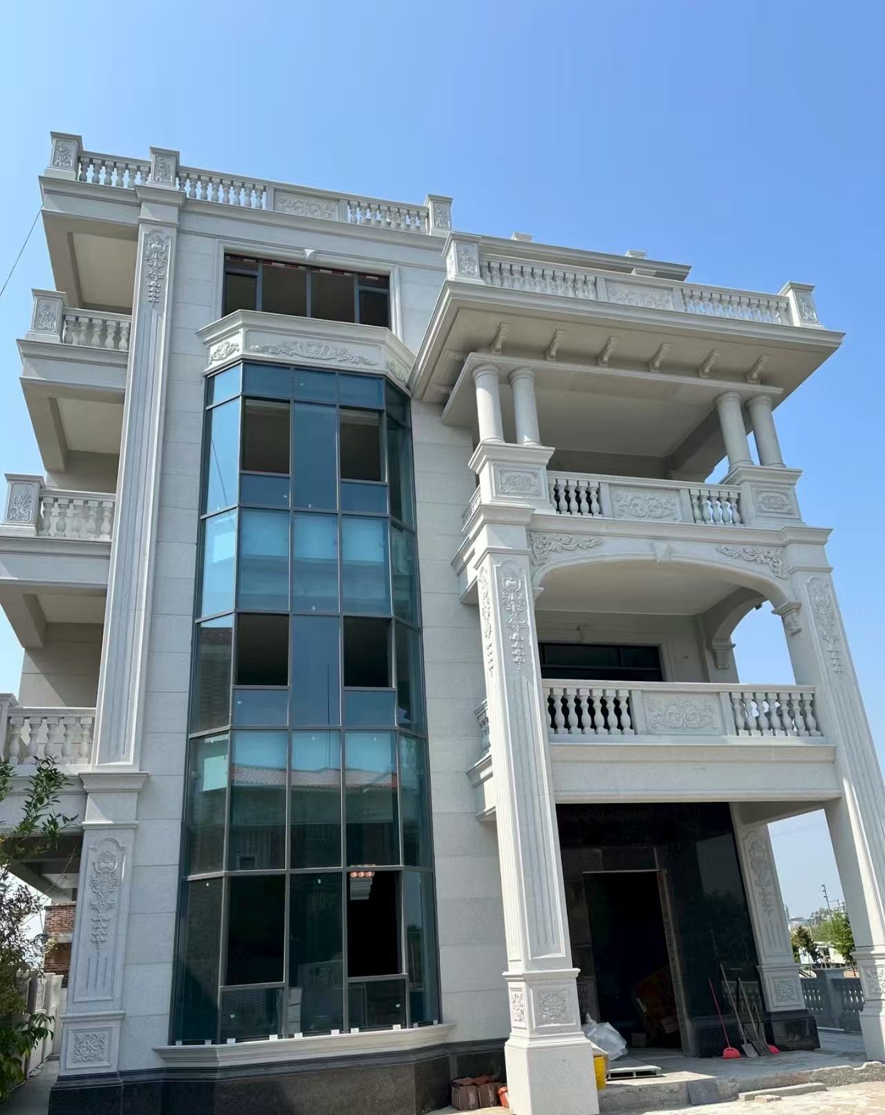 葫芦岛 白麻花岗岩别墅外墙干挂效果展示