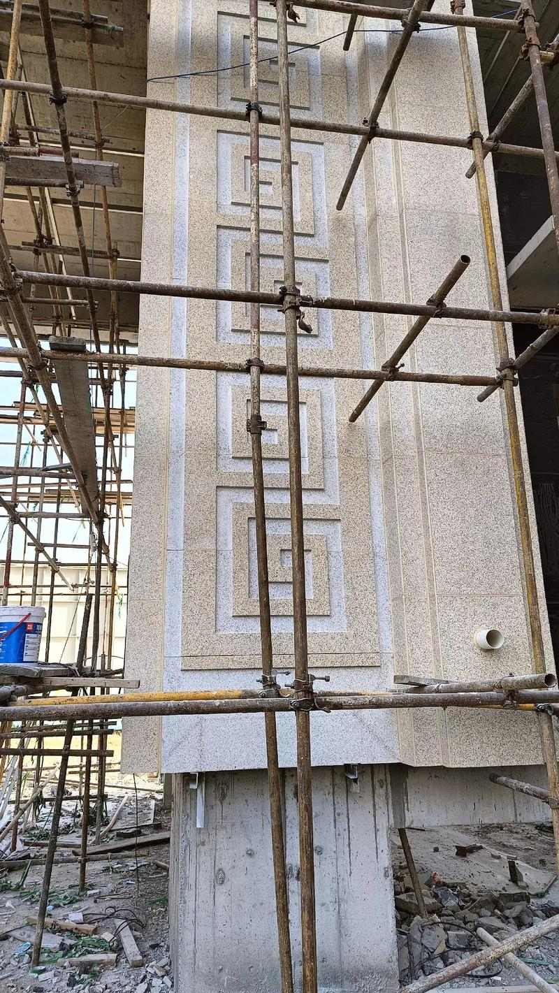 葫芦岛 黄金麻花岗岩别墅外墙干挂回纹造型效果