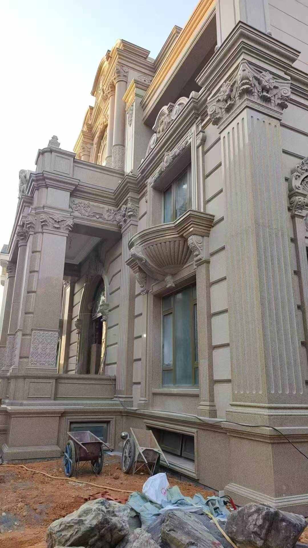 葫芦岛 黄金麻花岗岩光面别墅外墙干挂施工完成