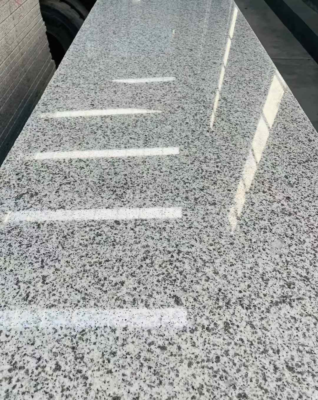 葫芦岛 白麻花岗岩光面毛板